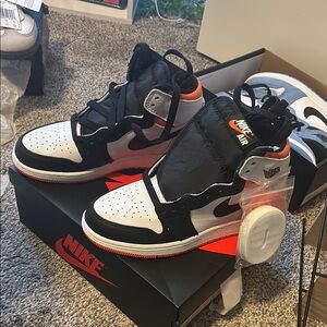 Nike Air Jordan High-Top Sneakers - Black and Orange